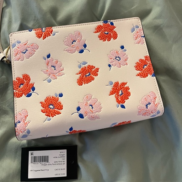 Morgan Dotty Floral Embossed Gusseted
Wristlet Kate spade SOLD OUT!! New w tags - Picture 6 of 6